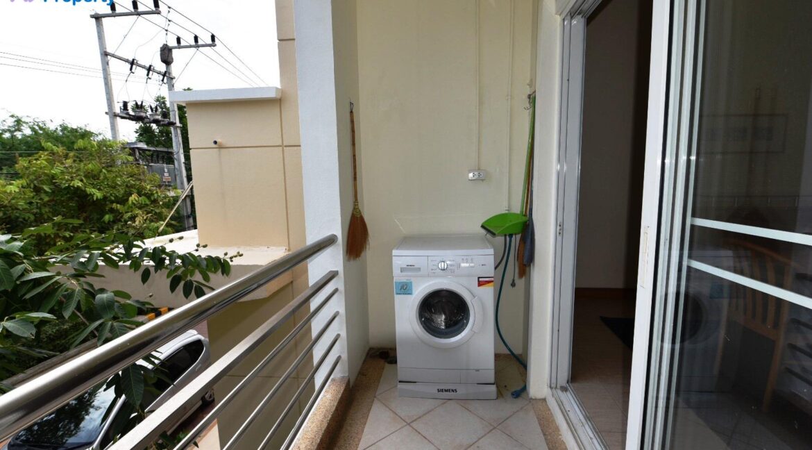 50 Washing mashine at kitchen balcony