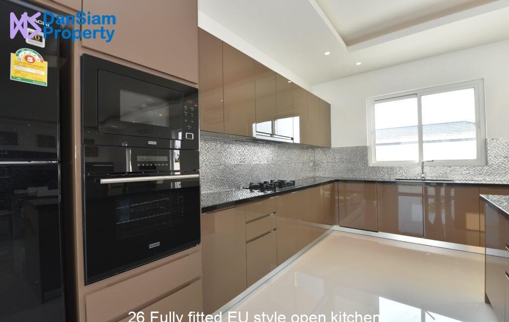 26 Fully fitted EU style open kitchen
