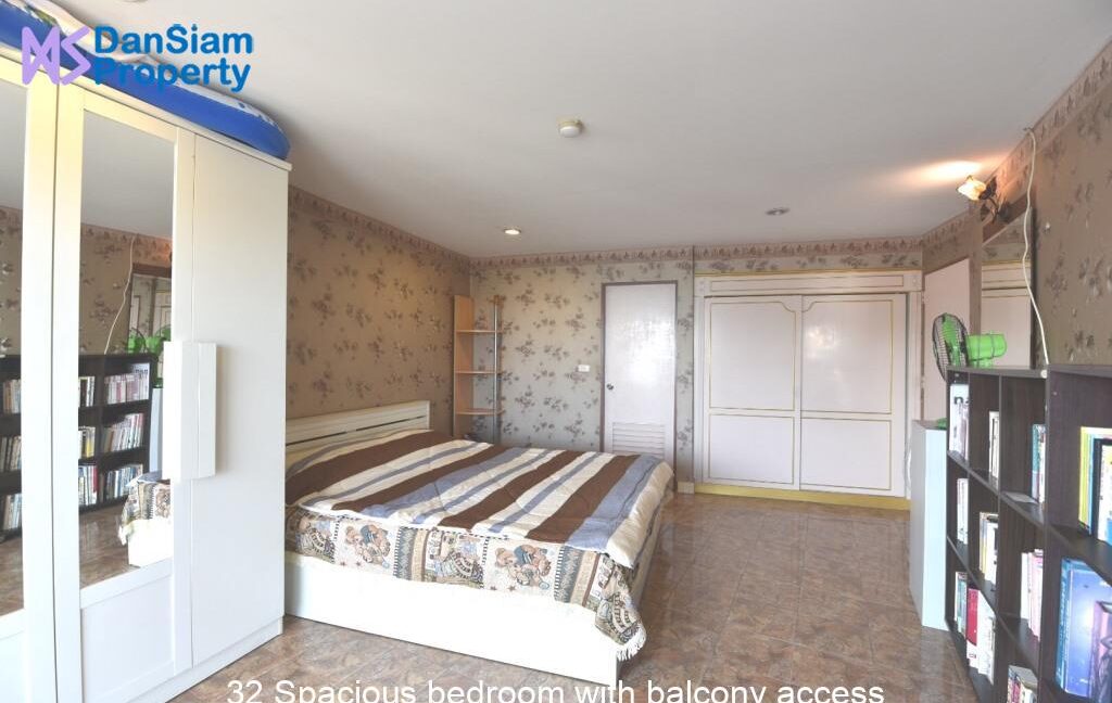 32 Spacious bedroom with balcony access