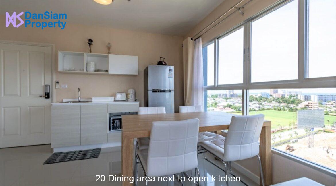 20 Dining area next to open kitchen