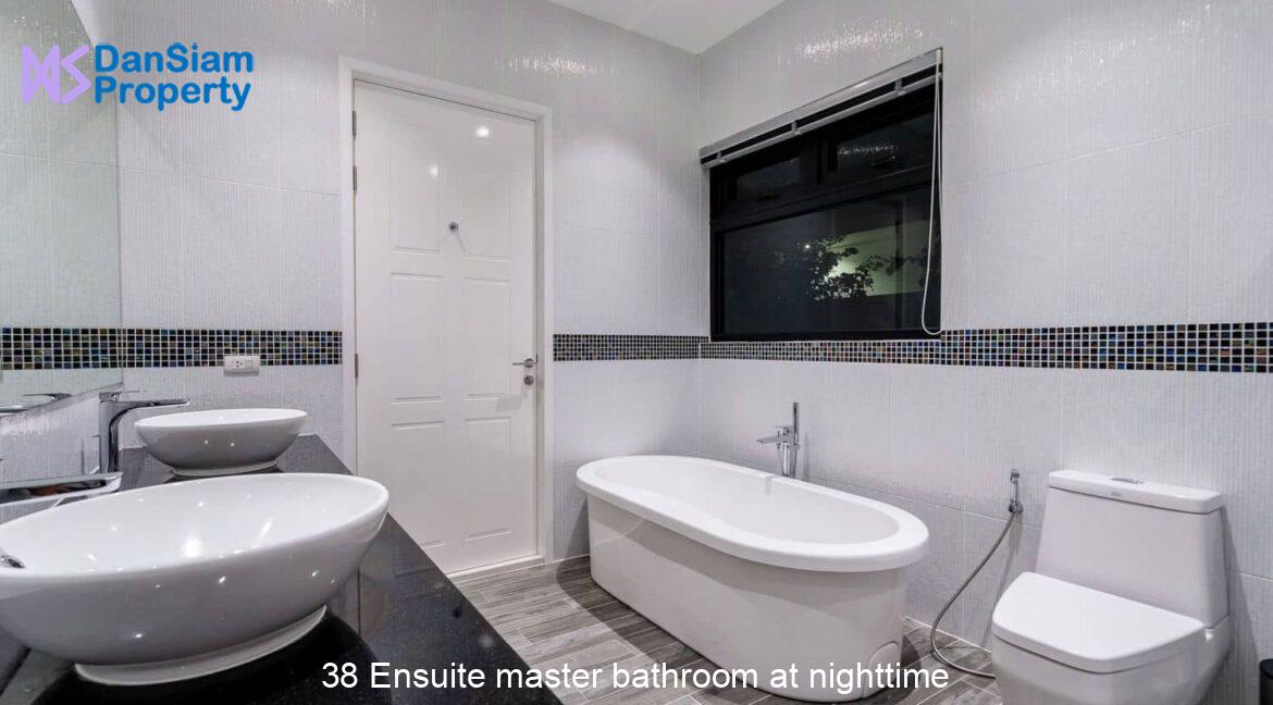 38 Ensuite master bathroom at nighttime
